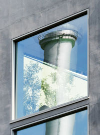 Reflection of chimney on window