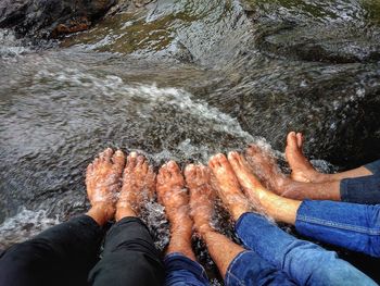 Low section of men in river