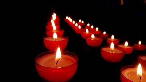 Close-up of illuminated candles