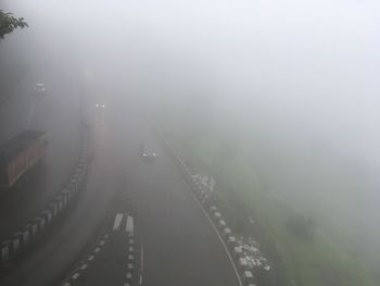 Aerial view of bridge in foggy weather