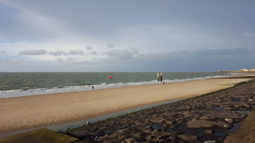 Scenic view of beach against sky