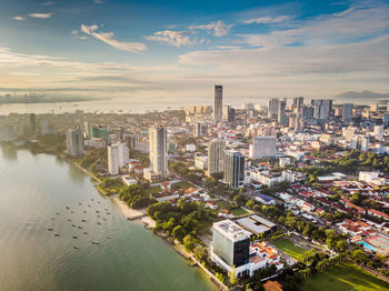 High angle view of buildings in city against sky