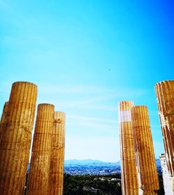 Low angle view of buildings against blue sky