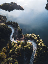 High angle view of road by city against sky