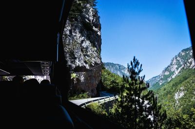 Panoramic view of mountains against clear sky