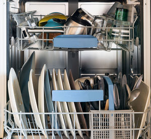 Close-up of utensils in rack