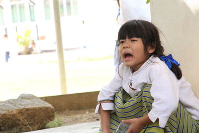 Cute girl standing outdoors