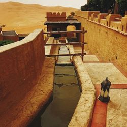 Man in front of building