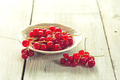 High angle view of strawberries in bowl on table