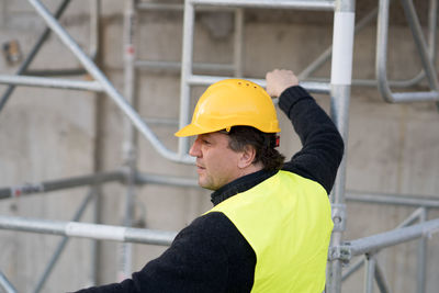 Construction worker on scaffolding