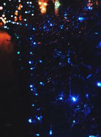 Low angle view of illuminated christmas lights