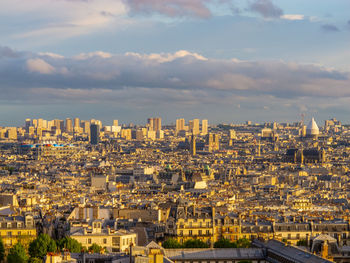 Cityscape of paris with cloudy sky from montmartre, paris, france