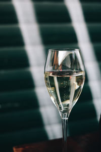 Close-up of beer glass on table