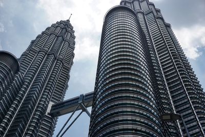 Low angle view of modern buildings against sky