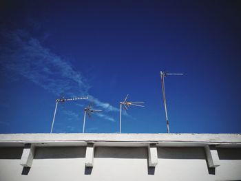 Low angle view of building against blue sky