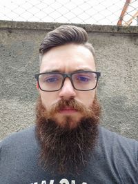 Portrait of young man wearing eyeglasses