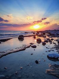 Scenic view of sunset over sea