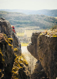 Rock formations on landscape against sky