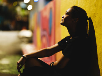 Night street portrait session with beautiful model