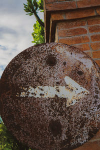 Close-up of cake on rusty metal