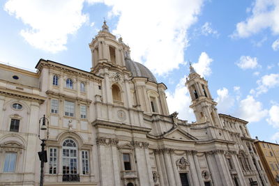 Sunny view of piazza navona with the blue sky and clouds in rome, italy