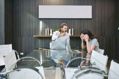 Woman sitting in a room