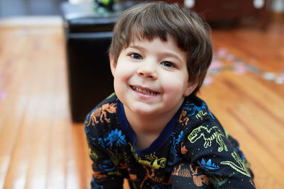 Close-up of cute boy looking away