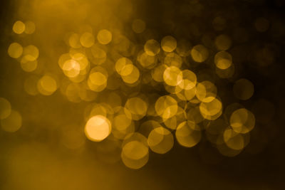 Glitter light gold bokeh abstract background
