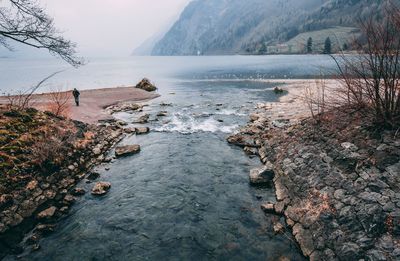 Scenic view of river against sky