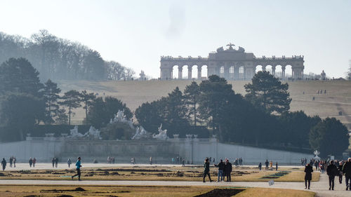 Group of people in front of historical building