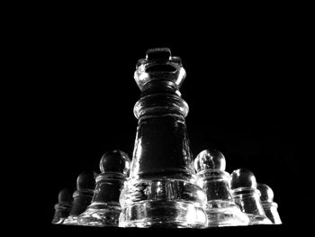 Close-up of bottle over black background