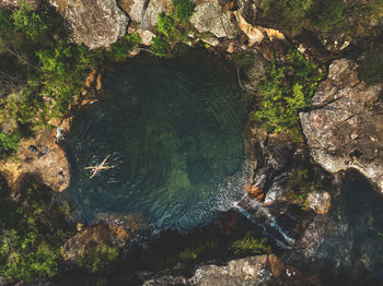 High angle view of rock formation in sea