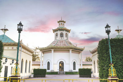 Chinese pagoda in a park at sunset chinese village landmark nature