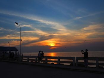 Scenic view of sea at sunset