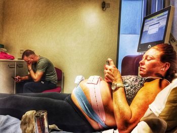 Portrait of young man sitting outdoors