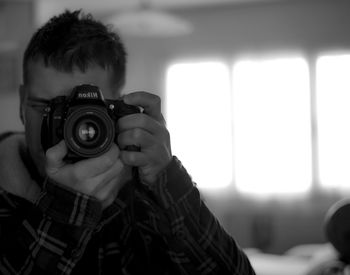 Close-up of camera on white background