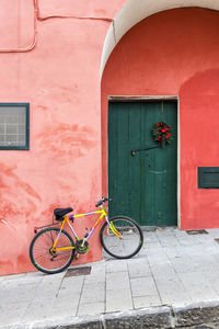 Bicycle parked outside building