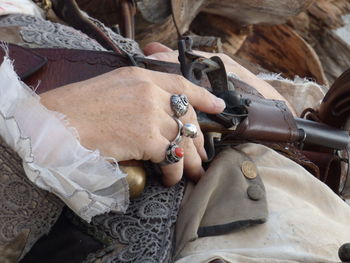 High angle view of man working on metal
