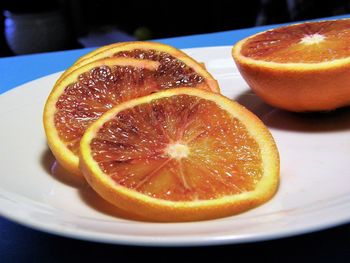 Close-up of orange slices on table