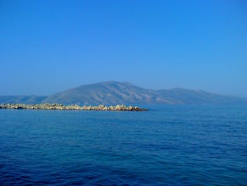 Scenic view of sea against clear sky