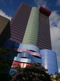 Low angle view of modern building against sky