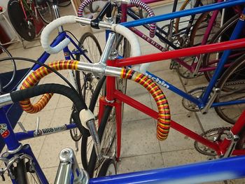 High angle view of bicycle parked against wall