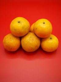 Close-up of orange fruits on table