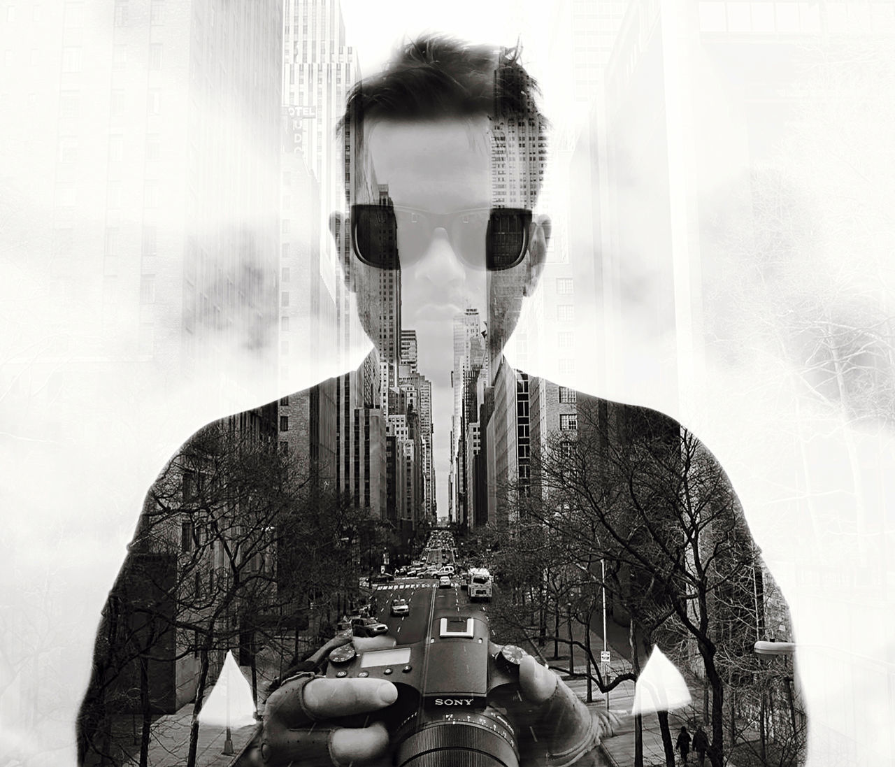 DIGITAL COMPOSITE IMAGE OF A MAN PHOTOGRAPHING