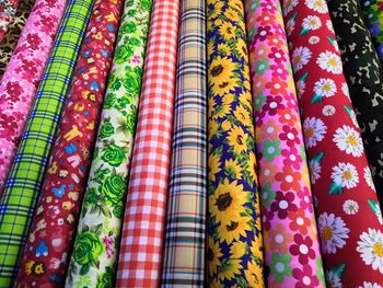 Full frame shot of multi colored fabrics for sale in market