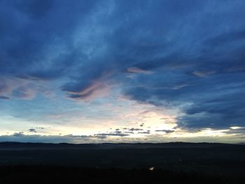 Scenic view of dramatic sky during sunset