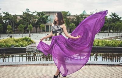 Woman with purple skirt