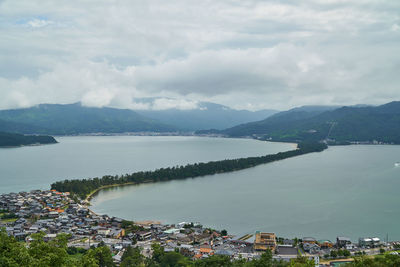 High angle view of townscape by sea