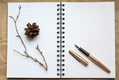 Directly above shot of book on paper