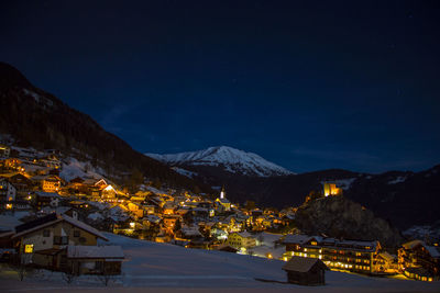 Illuminated cityscape at night